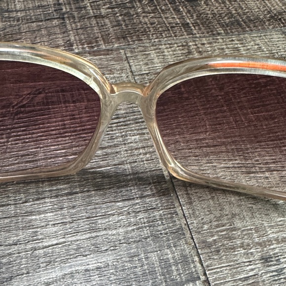 Oliver Peoples Transparent Sunglasses with pink tint Lenses